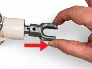 Sacar el gancho de la máquina toldo
